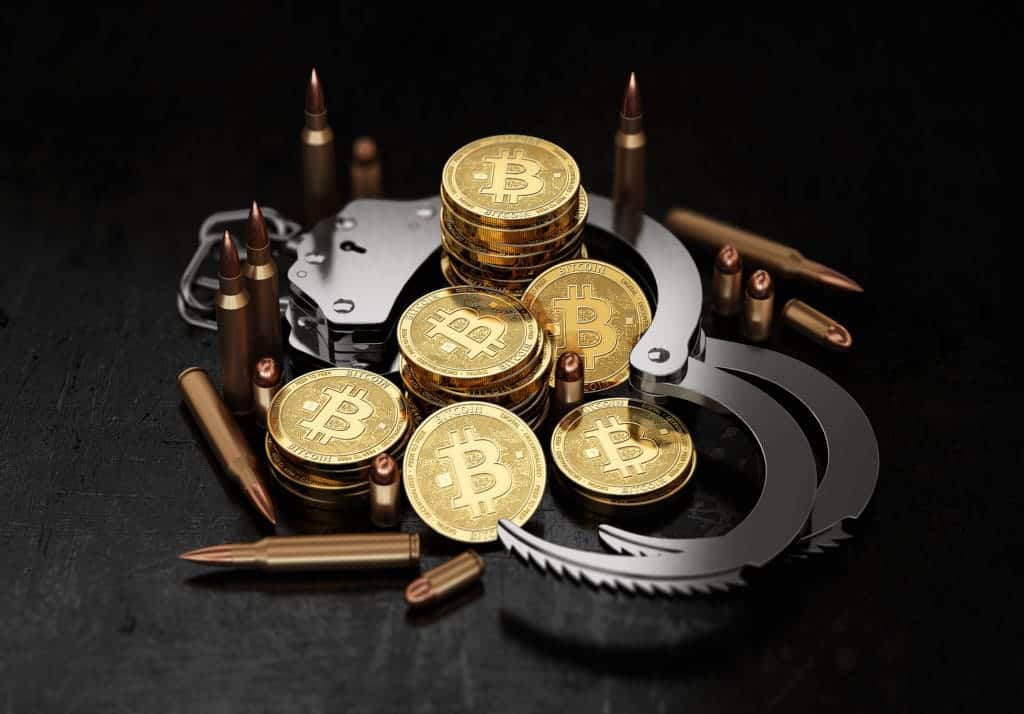 Bitcoin adoption "negatives" concept with handcuffs and bullets