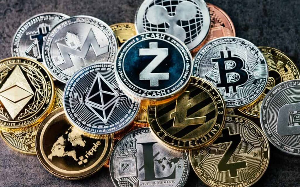 Cryptocurrency coins on table