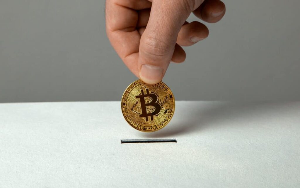Man Puts Bitcoin Into Piggybank